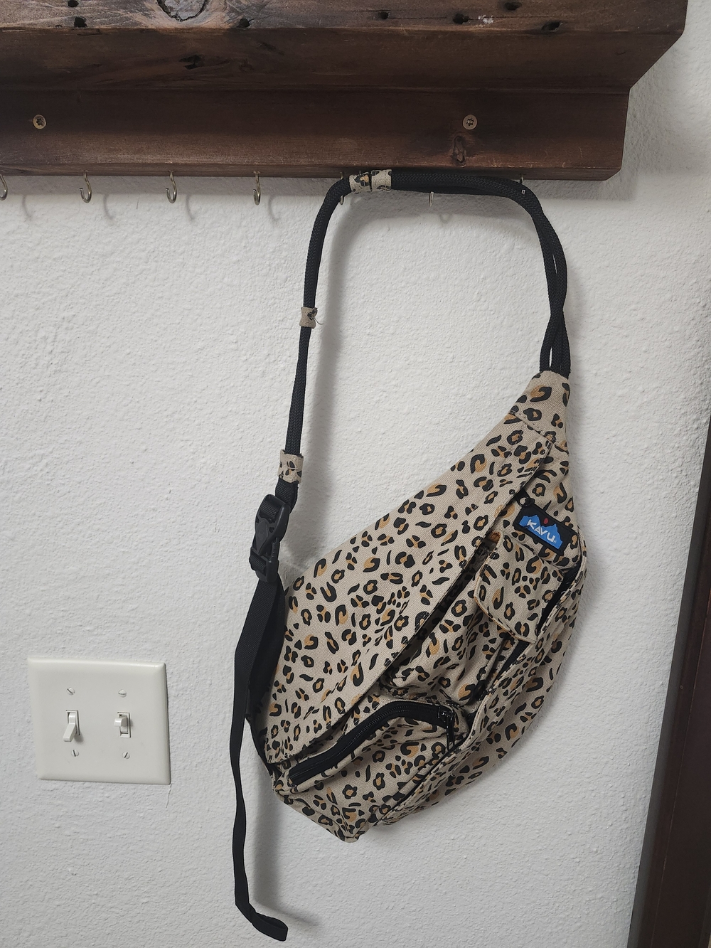 Kavu Leopard Print Crossbody Sling Bag in Khaki and Black